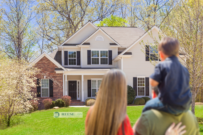 Family considering the family home after meeting with a property division lawyer in Fairfax